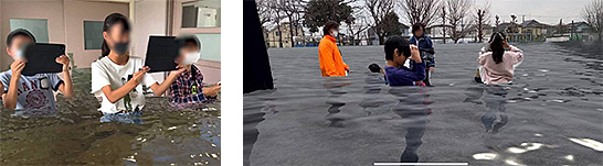 (写真3)災害体験アプリ「Disaster Scope」を利用した小学校での浸水体験シミュレーション(出典:拡張現実防災普及のホームページより引用) イメージ